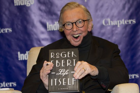 Roger Ebert with his biography Life Itself