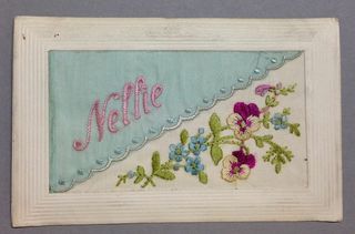 Nellie WWI silk postcard blue diagonal overlay