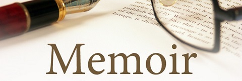 Memoir with glasses and pen