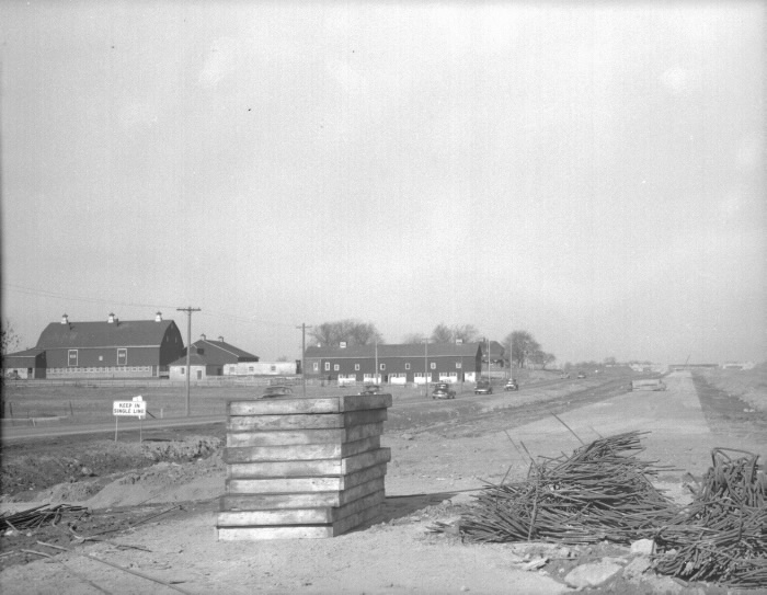 Highway 427, looking n. from n. of Bloor St. W., during construction, showing T. Eaton Co. farm at left 1953 Highway 427, looking n. from n. of Bloor St. W., during construction, showing T. Eaton Co. farm at left 1953
