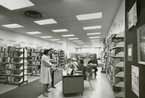 customers talking to staff in Eglinton Square branch around 1971 customers talking to staff in Eglinton Square branch around 1971