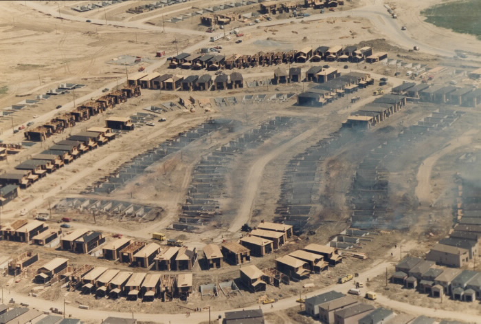 Aftermath of fire in subdivision with many burnt down houses Aftermath of fire in subdivision with many burnt down houses