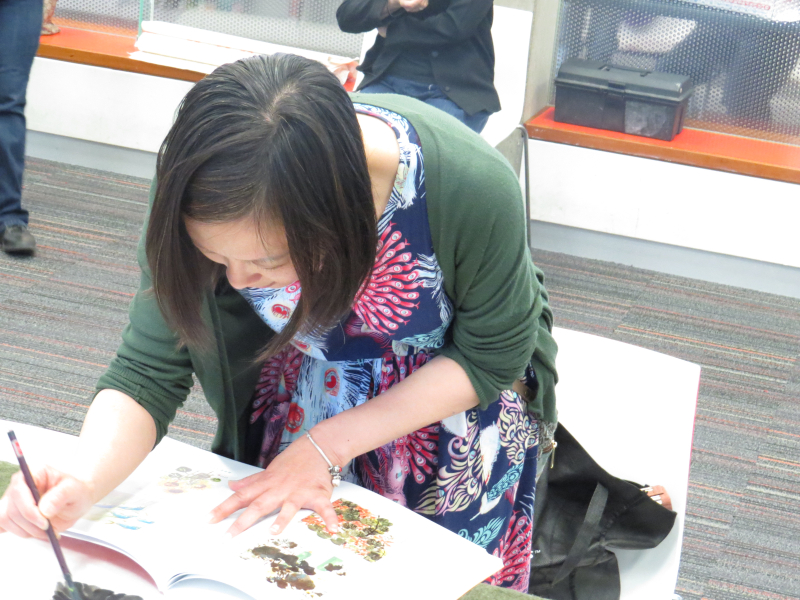 TPL staff Zoe practiced with the brush TPL staff Zoe practiced with the brush