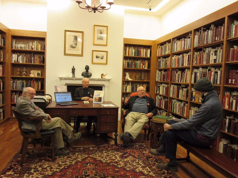 Friends of the Arthur Conan Doyle Collection chatting with a library visitor