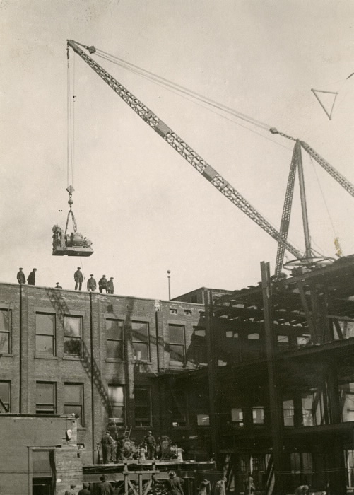 Eaton, T., Company, shop, Yonge St., w. side, between Queen & Albert Sts 1923 Lifting a Seven Ton Motor Eaton, T., Company, shop, Yonge St., w. side, between Queen & Albert Sts 1923 Lifting a Seven Ton Motor