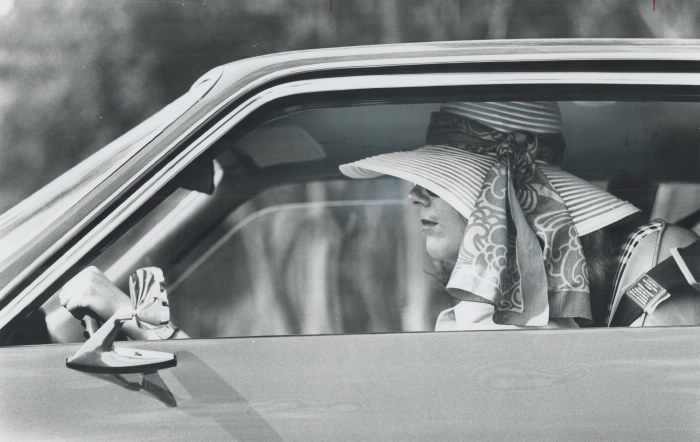 1974 photo Big-Brimmed hat is hazardous for the driver because it blocks side vision. Another fashion hazard is platform shoes which reduces sensitivity of the foot on the pedals. Toronto Star Archives 1974 photo Big-Brimmed hat is hazardous for the driver because it blocks side vision. Another fashion hazard is platform shoes which reduces sensitivity of the foot on the pedals. Toronto Star Archives