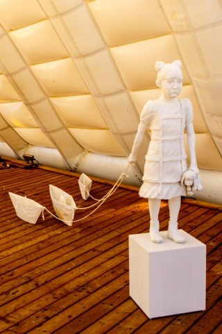 The Girl with Paper Boats