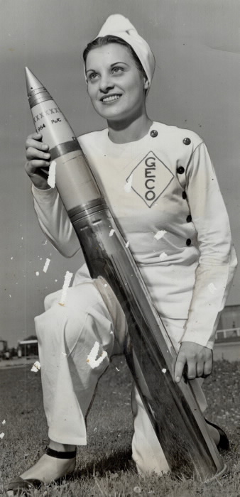 1944 photo of woman with shell for gun