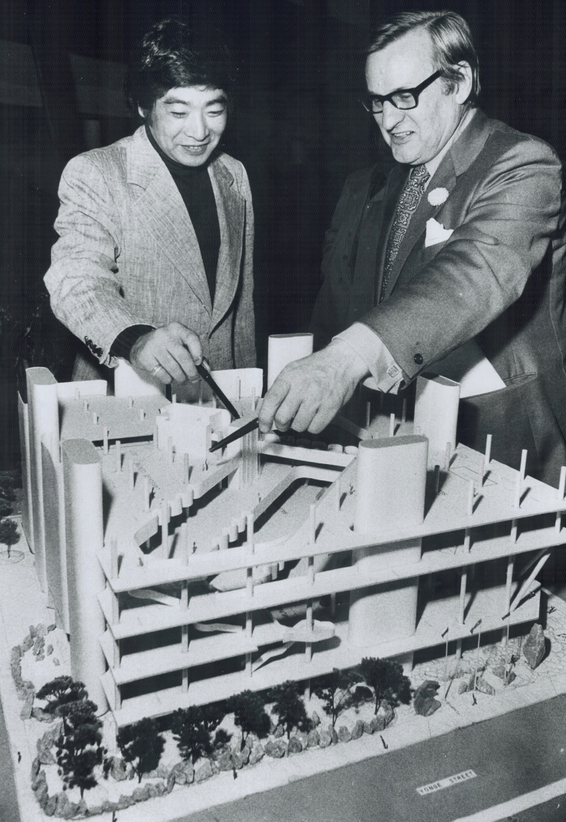 1973 Toronto Star photo: a model of the proposed new $30 million Central library with Raymond Moriyama  architect and Alderman William Archer