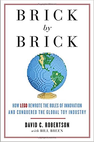 Book cover showing a globe made in lego blocks Book cover showing a globe made in lego blocks