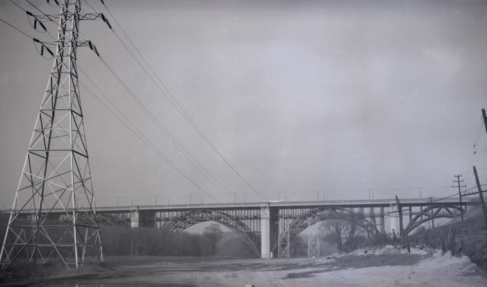 Bloor viaduct in profile  with power lines prominently visible
