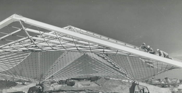1971 photo The Forum during construction hyperbolic paraboloid positioned on cement bastions Ontario Place