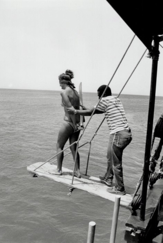 Party At Sea Jolly Roger Pirate forces a visiting damsel to walk the plank by George Bryant