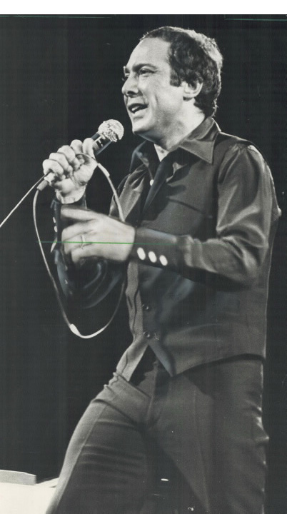 Man holding a microphone Man holding a microphone