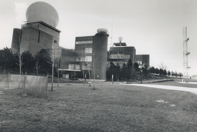 Building with large sphere on roof
