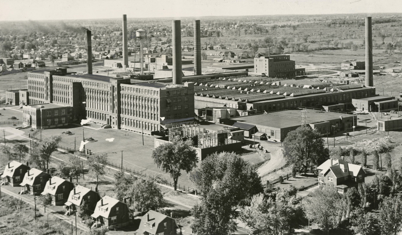 Aerial view of factories with smoke stacks