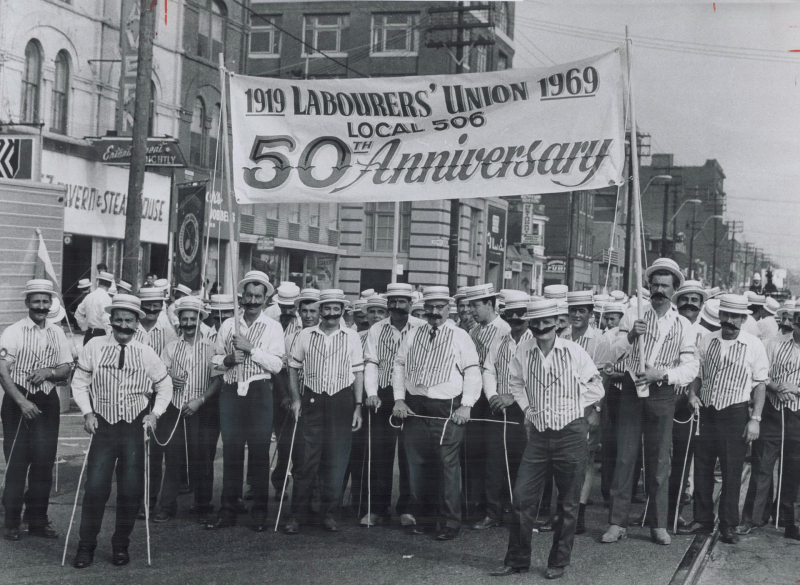 Toronto laborers celebrating their union's 75th anniversary paraded in 1890s costumes in the 1969 Labor Day march to the CNE