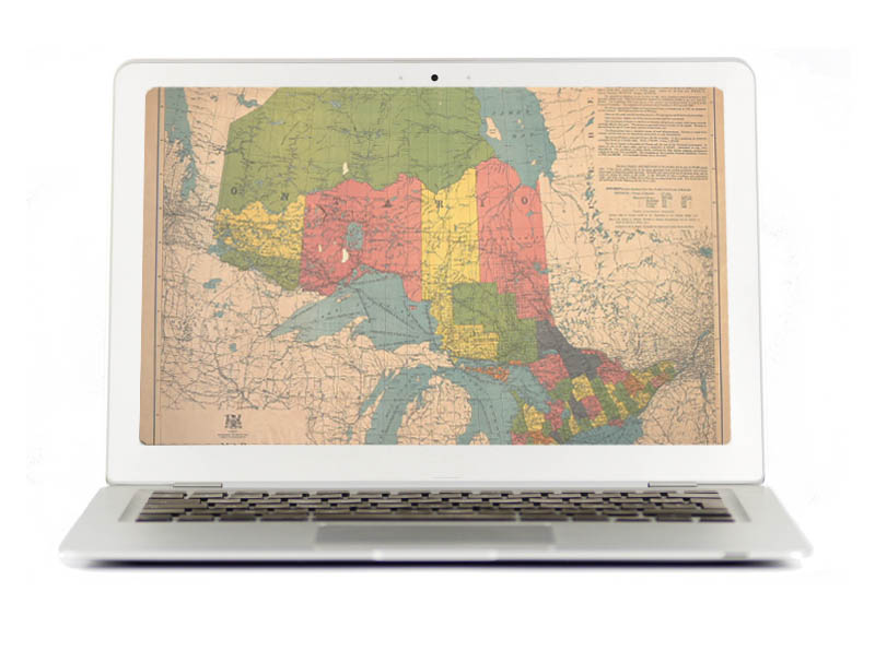 Laptop with vintage image Ontario map on its entire screen Laptop with vintage image Ontario map on its entire screen
