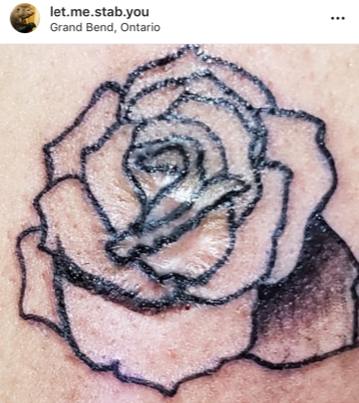 image of one of K's tattoos with a scar