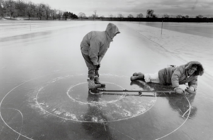 Roundabout Don Powell holds the marker while John Wylie draws the house circles in preparation for bonspiel - Toronto Star Photographic Archives 1993 Roundabout Don Powell holds the marker while John Wylie draws the house circles in preparation for bonspiel - Toronto Star Photographic Archives 1993