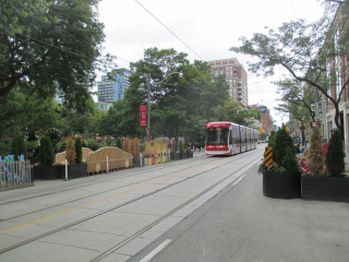 An empty street with a streetcar