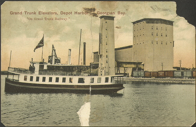 Postcard showing the harbor's grain elevators and portion of the Grand Trunk Railway on Georgian Bay.
