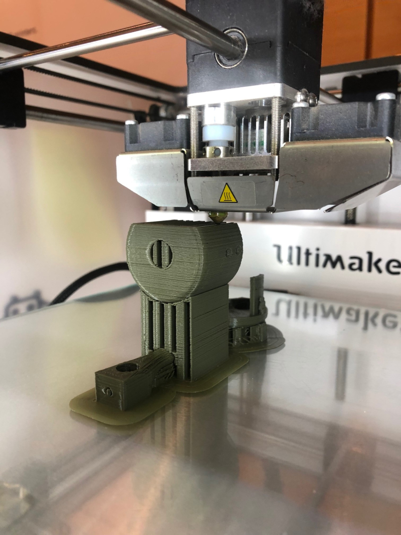 image of Makerbot 3d printer creating K's prototype