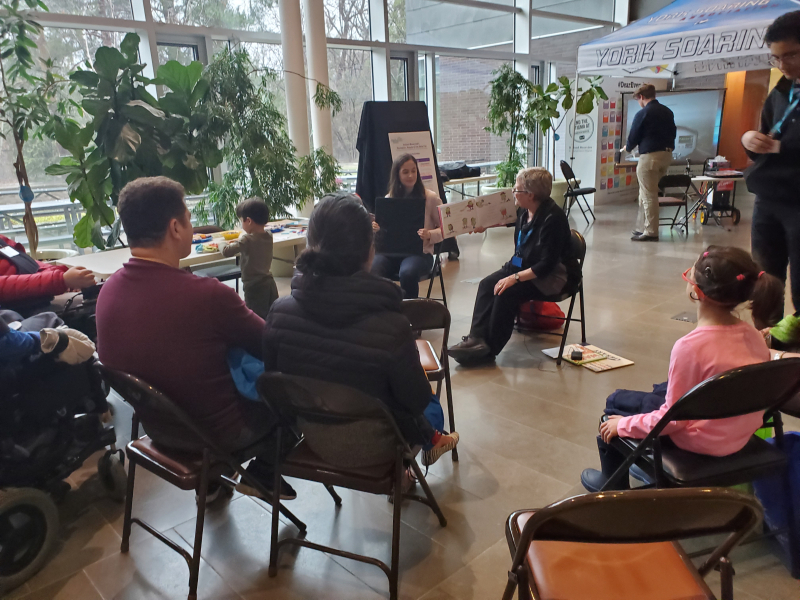 Families enjoy a storytime with TPL staff at Holland Bloorview