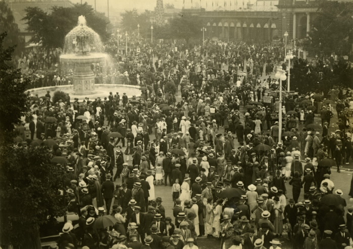 Vintage photo of crowd on fairgrounds with large fountain
