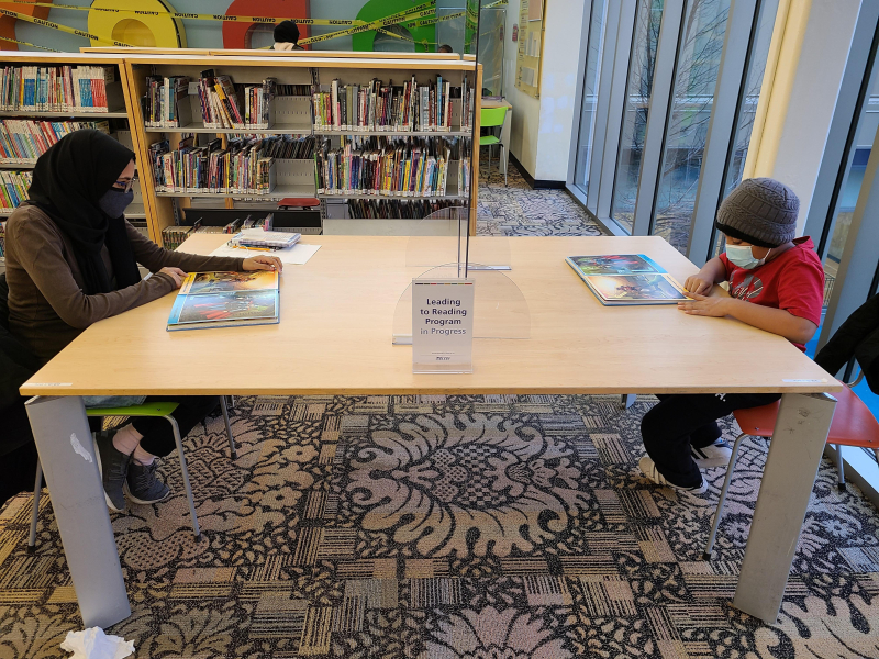 Leading to Reading volunteer and student at Thorncliffe Leading to Reading volunteer and student at Thorncliffe