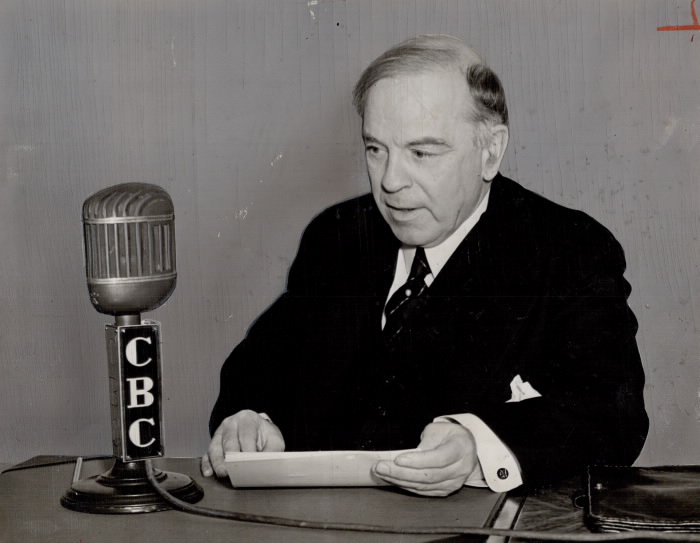 Photograph of Prime Minister William Lyon Mackenzie King speaking into a CBC microphone