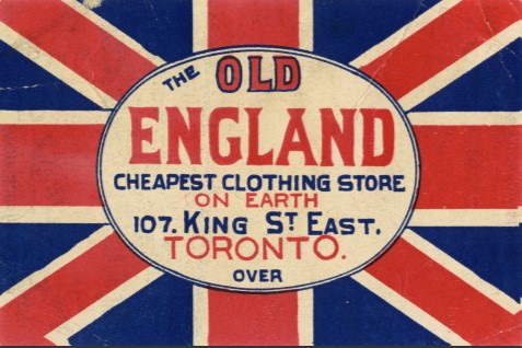 Trade card for The Old England clothing store with logo over Union Jack flag