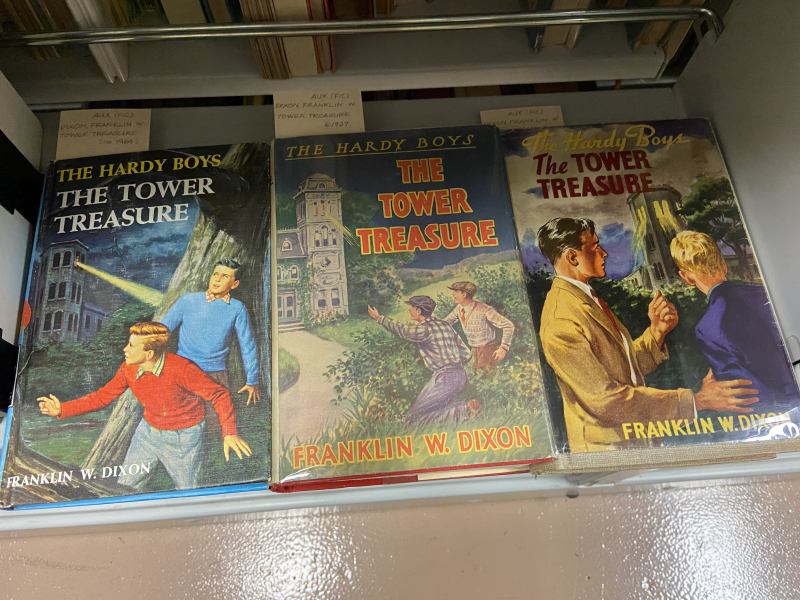 Three editions of The Hardy Boys book The Tower Treasure