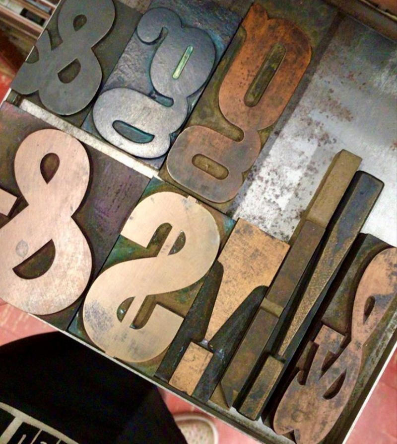 Wood type in a type case, from my personal photos, taken at Massey College, Toronto.