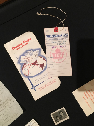 A collection of travel documents including a passenger identification tag from Trans-Canada Air Lines. Passenger name is handwritten. A small black and white photo of a mother and daughter appears at bottom.  
