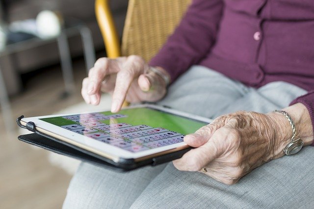 Senior using a tablet