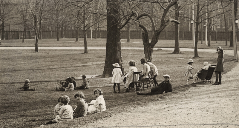 Vintage photo of park with children sitting