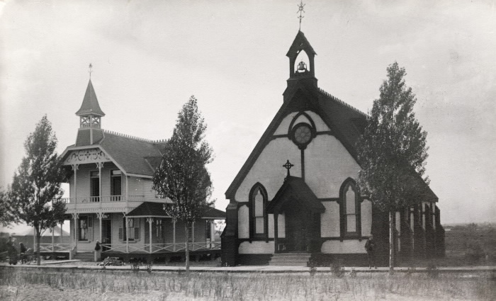 Two church buildings in open field