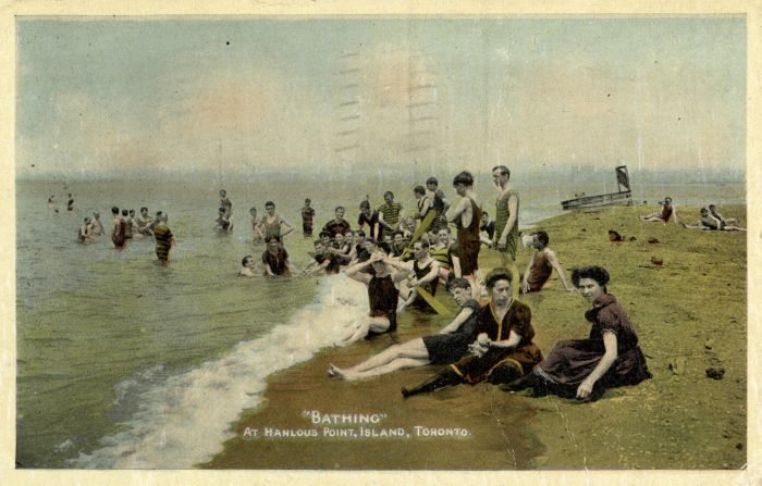 Postcard showing bathers by beach and words Bathing at Hanlans point  Island  Toronto