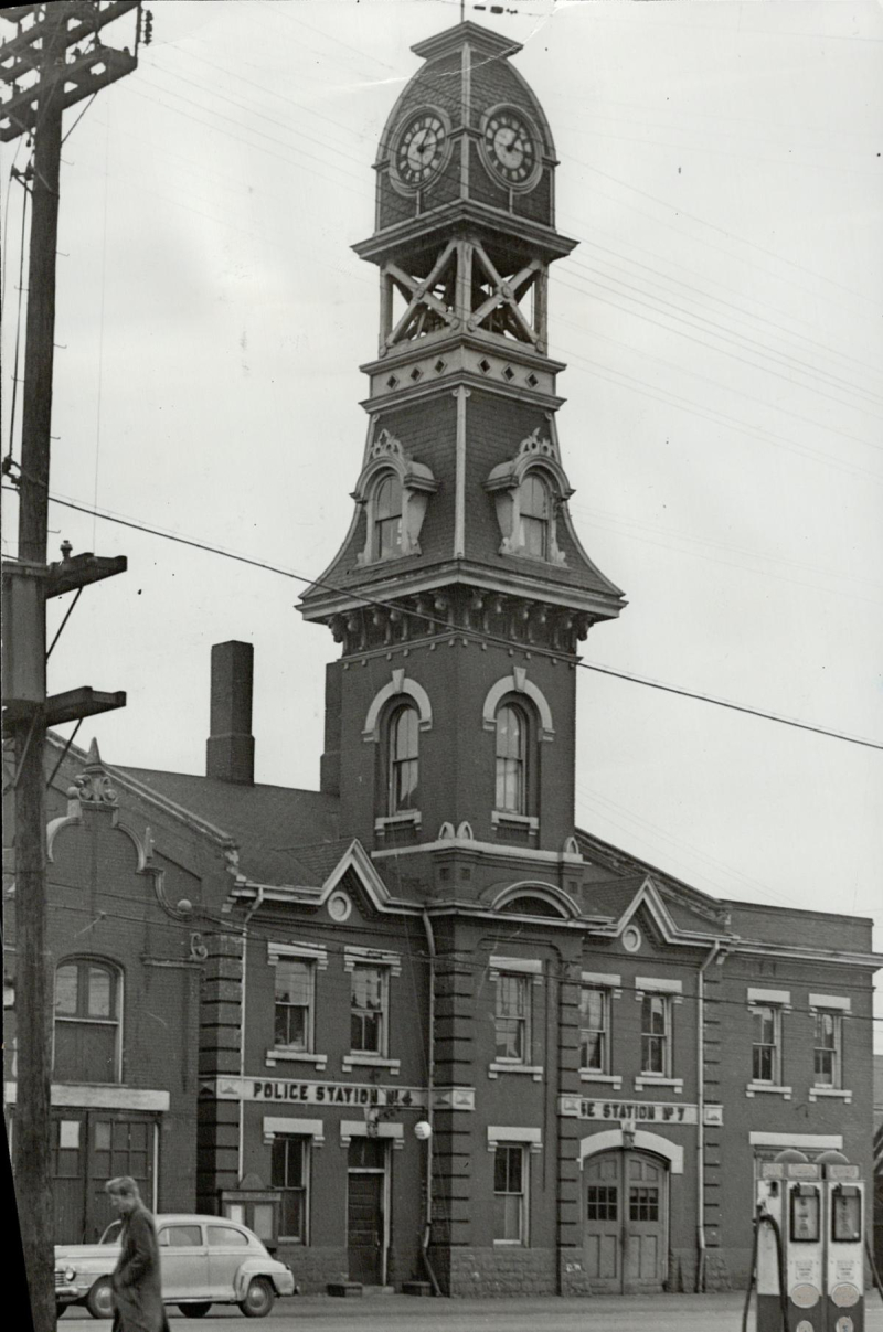Vintage photo of polic station with clock tower