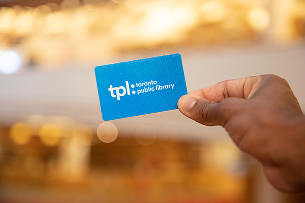 Card in hand TPL card being held up