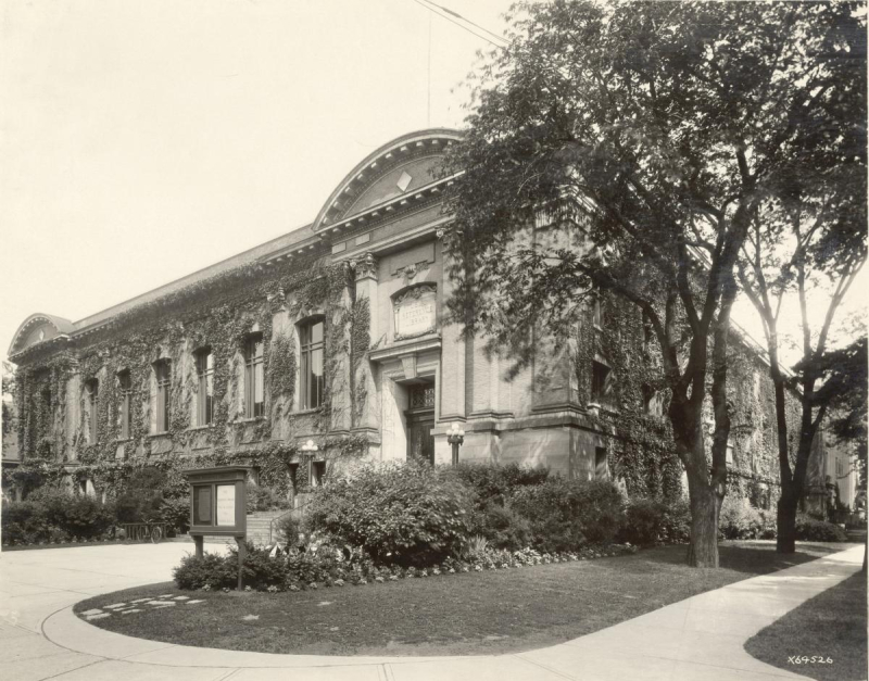 Large building on corner in old photo