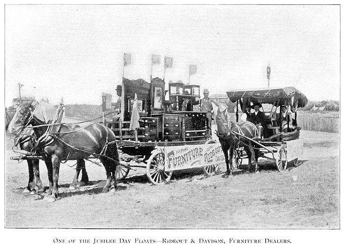 Framed black and white vintage photo of elaborate horse drawn carriage