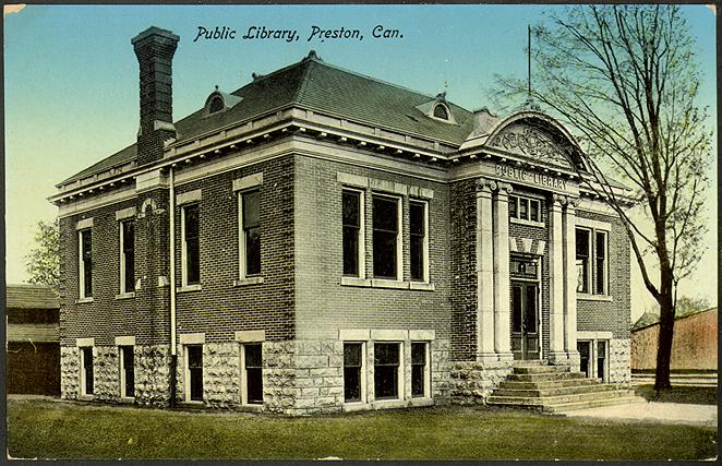 Two storey red brick library building. 
