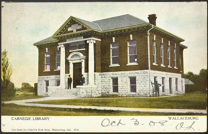 Two storey red brick library building. 