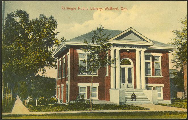 Brick two storey library building with text Carnegie Public Library, Watford, Ontario.