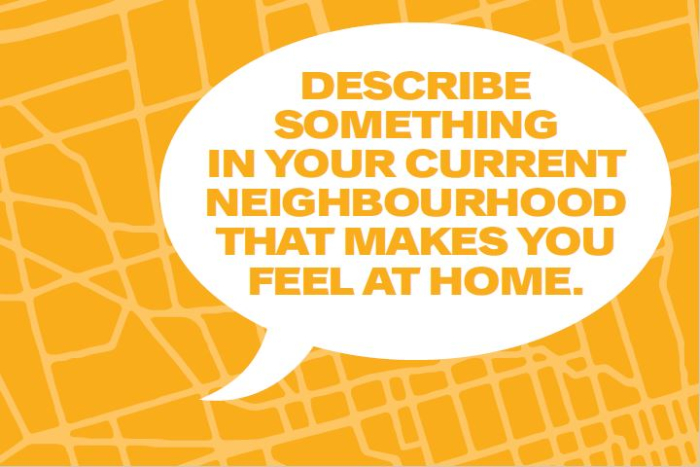Speech bubble says "Describe something in your current neighbourhood that makes you feel at home." Background is yellow street grid.
