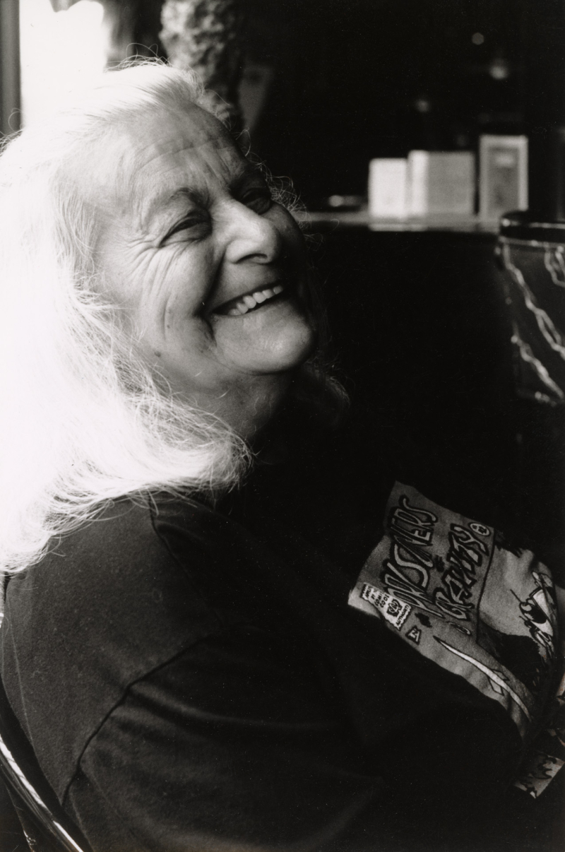 Judith Merril in a Prisoners of Gravity tshirt 1995