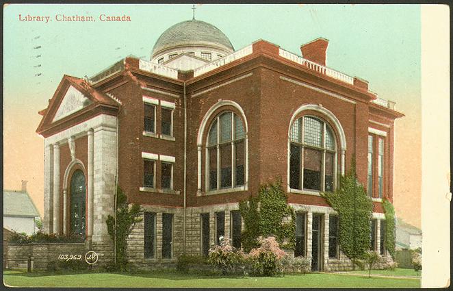 Postcard of bright red building with blue dome 