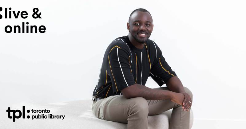 Man sitting on a beige couch with a friendly expression Man sitting on a beige couch with a friendly expression